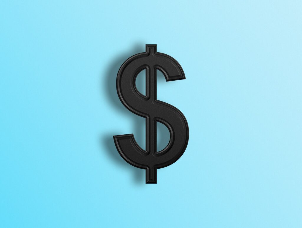a black dollar sign on a blue background